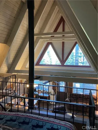 a bedroom with bed or furniture and a flat screen tv