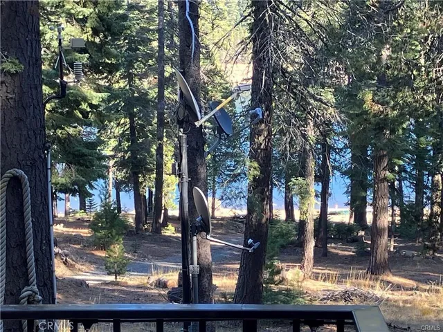 a view of house with a yard