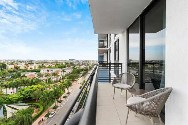an outdoor view of garden with seating area