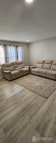 a living room with furniture and a couch