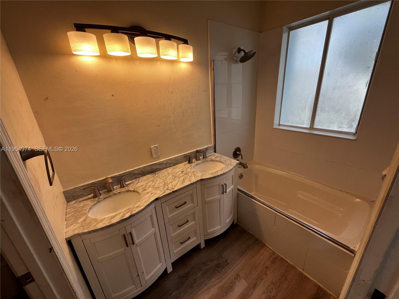 3021 Laurel Ridge Circle Riviera Beach, FL 33404 - Photo 23 of 34 Primary Full Bath 1