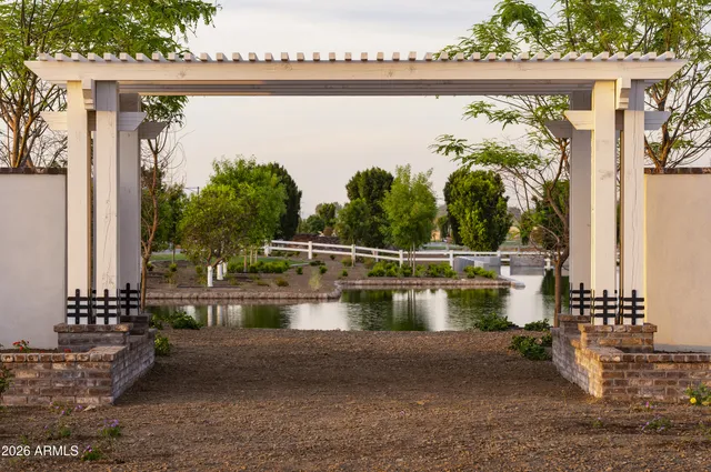 a view of a swimming pool with a lake view