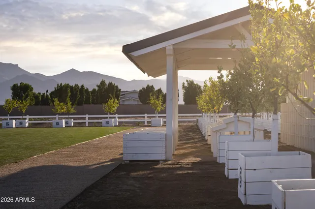 a outdoor living space with patio furniture and a garden