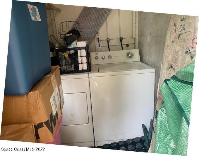 39-41 Patrick Lane, Unit A & B Rockledge, FL 32955 - Photo 11 of 22 a utility room with dryer and washer