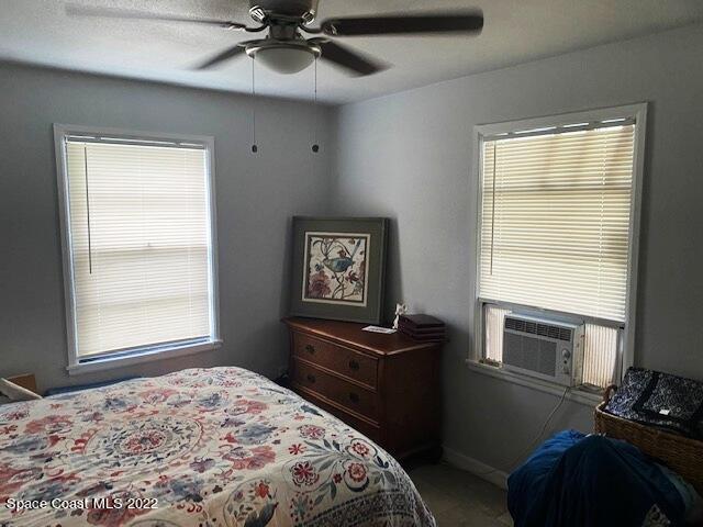 39-41 Patrick Lane, Unit A & B Rockledge, FL 32955 - Photo 13 of 22 a bedroom with a bed and a window