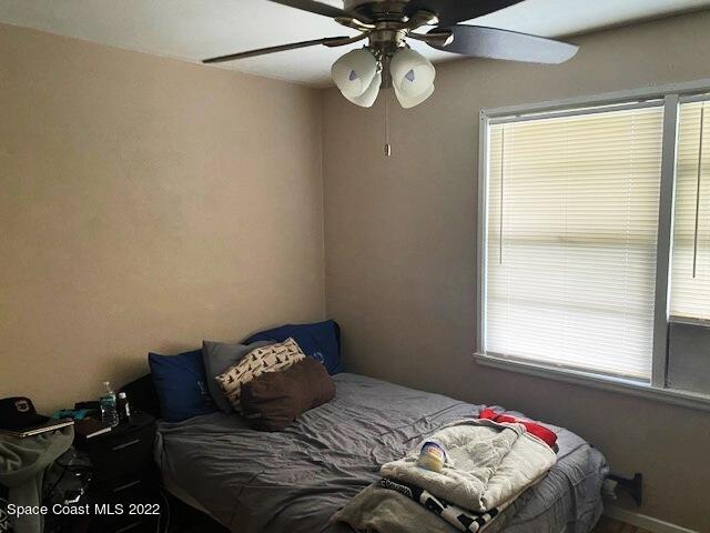 39-41 Patrick Lane, Unit A & B Rockledge, FL 32955 - Photo 15 of 22 a bedroom with a bed and a window