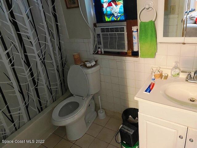 39-41 Patrick Lane, Unit A & B Rockledge, FL 32955 - Photo 17 of 22 a bathroom with a toilet and a sink