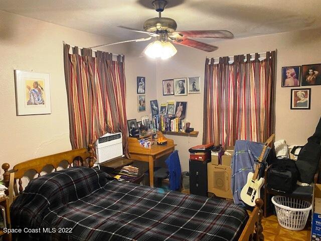 39-41 Patrick Lane, Unit A & B Rockledge, FL 32955 - Photo 20 of 22 a living room with furniture and a chandelier