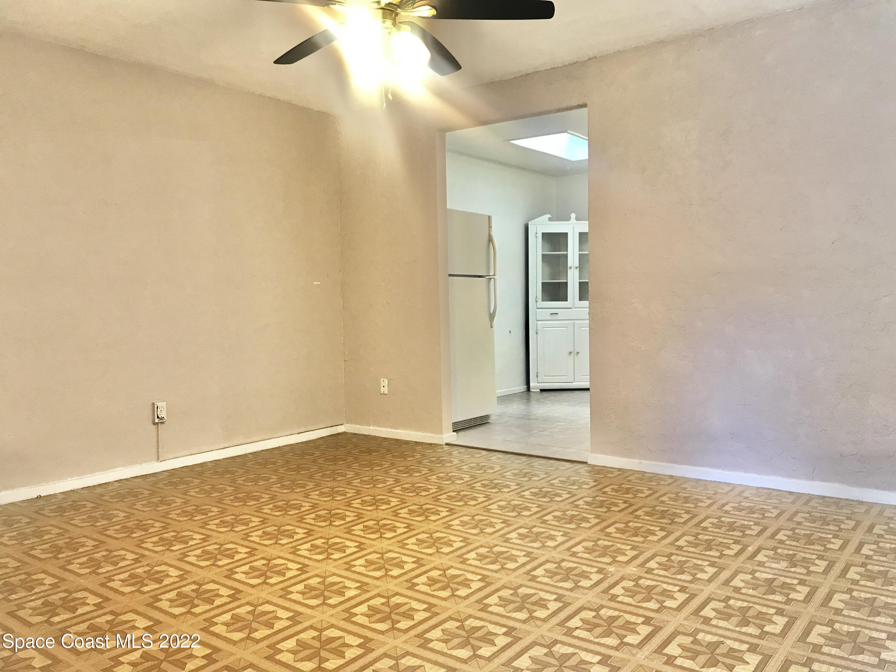 39-41 Patrick Lane, Unit A & B Rockledge, FL 32955 - Photo 2 of 22 an empty room with a natural light