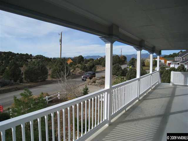 21380 Graves Road Reno, NV 89521 - Photo 6 of 6 a view of a balcony with chairs