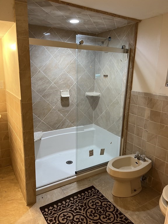 46 Anderson Drive Randolph, MA 02368 - Photo 4 of 4 a bathroom with a toilet and a shower