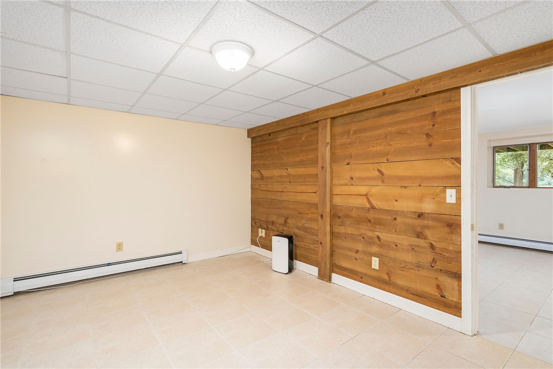 1104 Sisson Road Coventry, RI 02827 - Photo 31 of 50 In-law bedroom with beautiful wood paneled wall