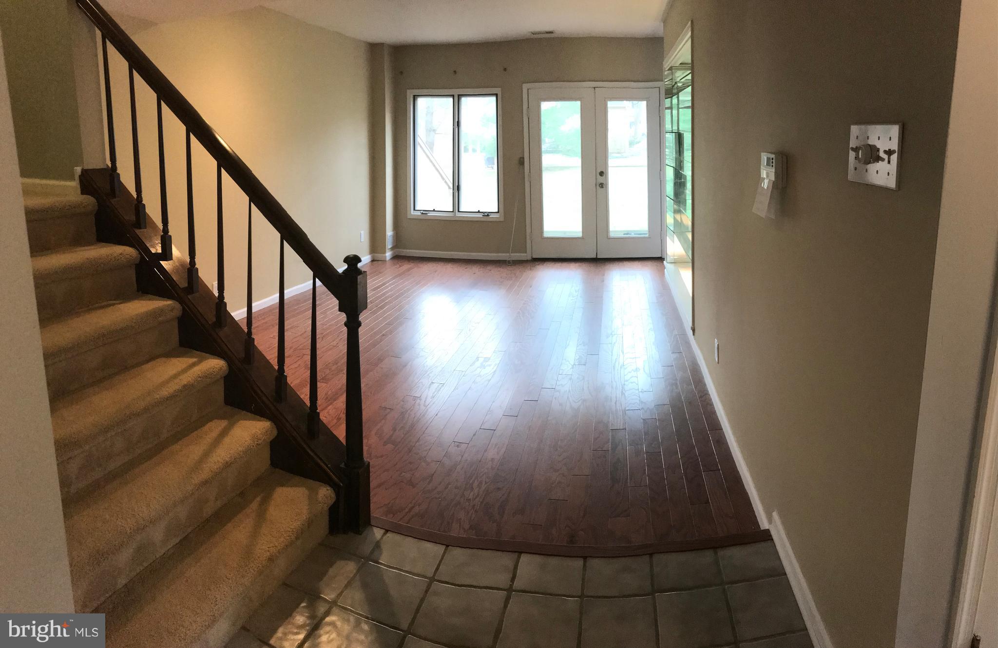 77 Amity Drive Wayne, PA 19087 - Photo 5 of 18 Formal living room with built-in glass shelving