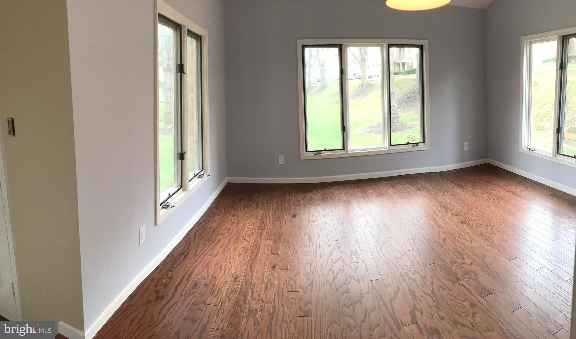 77 Amity Drive Wayne, PA 19087 - Photo 7 of 18 Formal living room with windows on 3 sides.