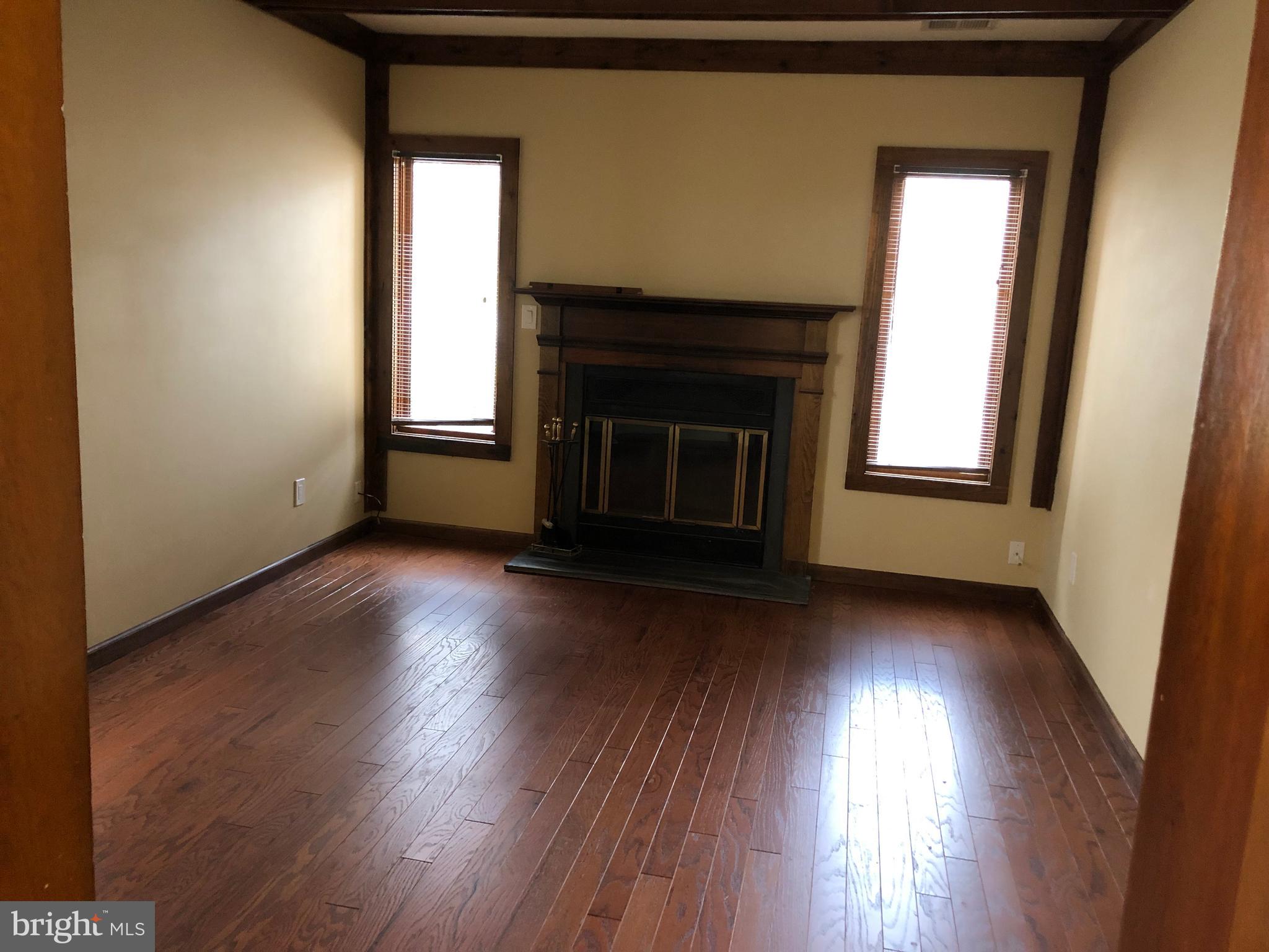 77 Amity Drive Wayne, PA 19087 - Photo 8 of 18 Den/family room with fireplace