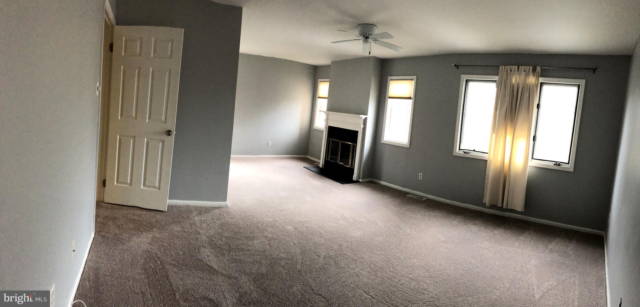 77 Amity Drive Wayne, PA 19087 - Photo 9 of 18 Master bedroom with fireplace and seating area