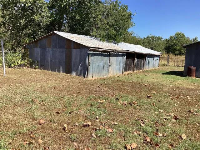 a house with yard in front of it
