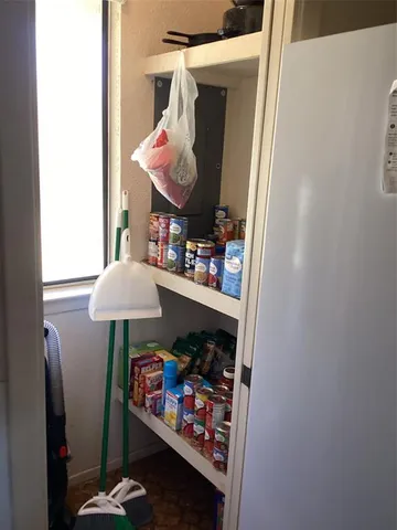 a store room with washer and dryer