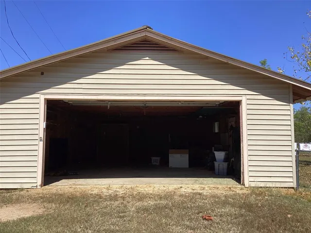 a view of a house with a garage