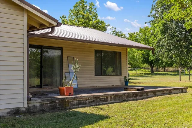 a view of a house with a swimming pool
