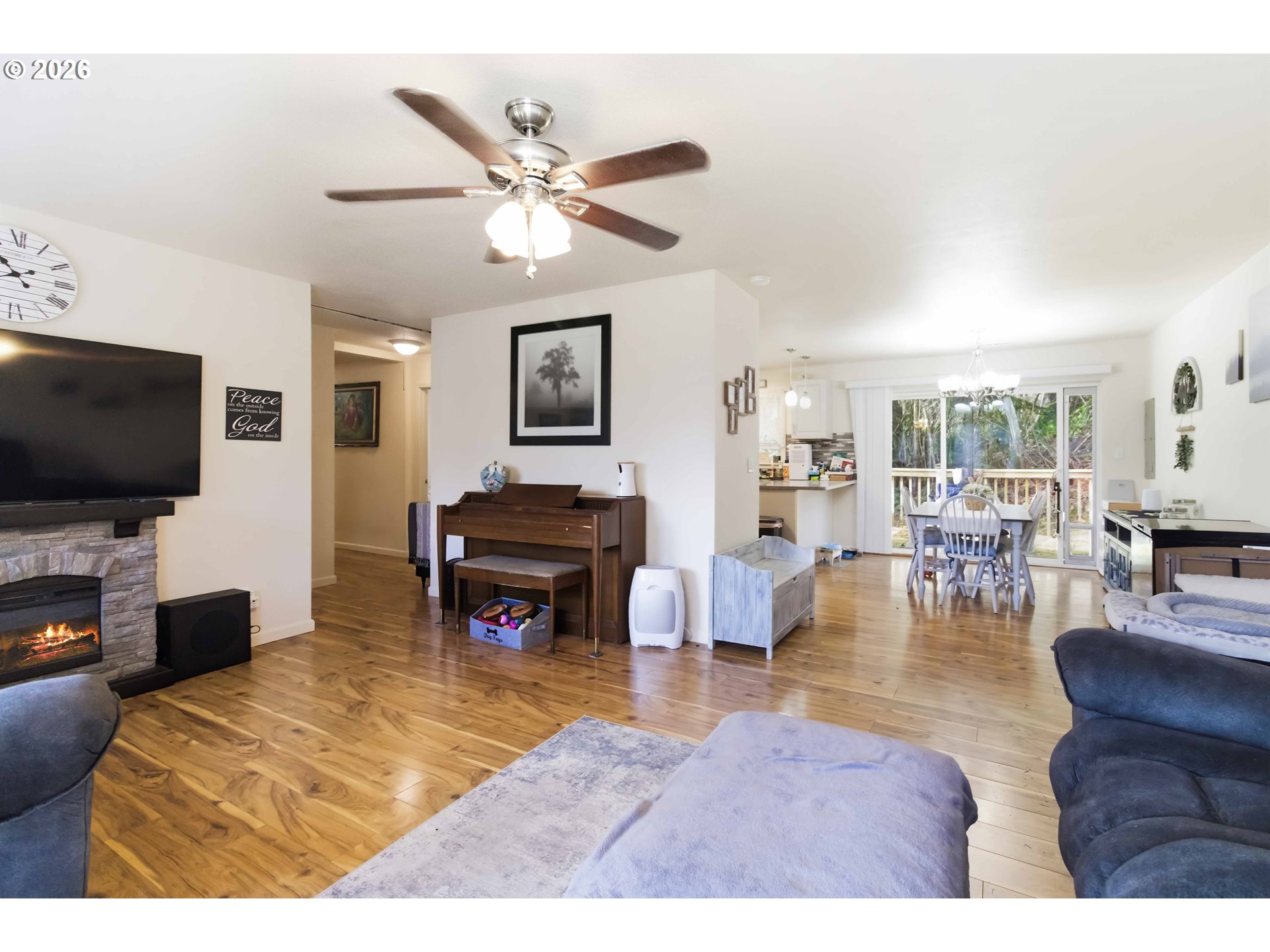 421 McAdams Road East Longview, WA 98632 - Photo 5 of 40 a living room with furniture and a flat screen tv