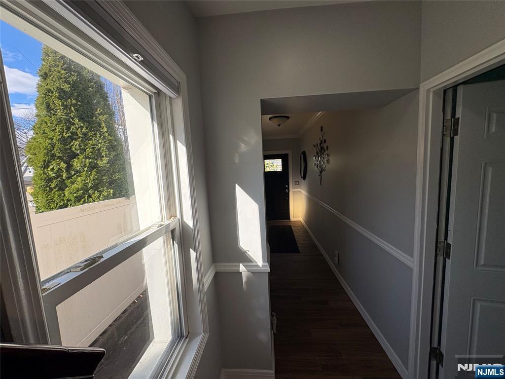 282 Harding Avenue, Unit 1 Teaneck, NJ 07666 - Photo 5 of 21 a view of hallway with stairs