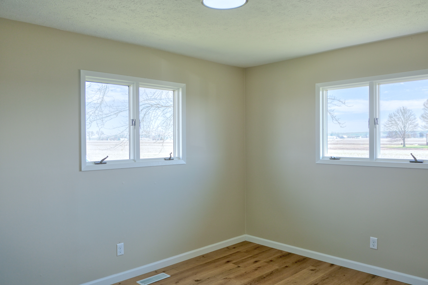 676 Swan Pond Road Jacob, IL 62950 - Photo 13 of 42 a view of a room with wooden floor and windows