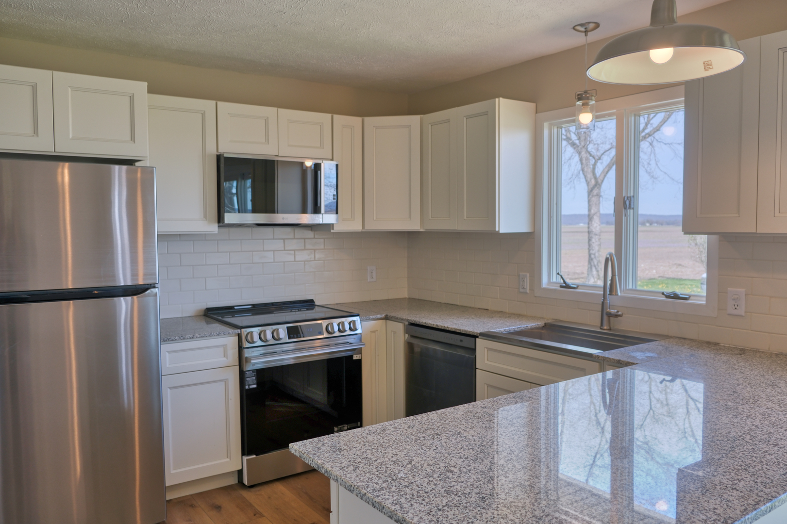 676 Swan Pond Road Jacob, IL 62950 - Photo 16 of 42 a kitchen with a stove and a refrigerator