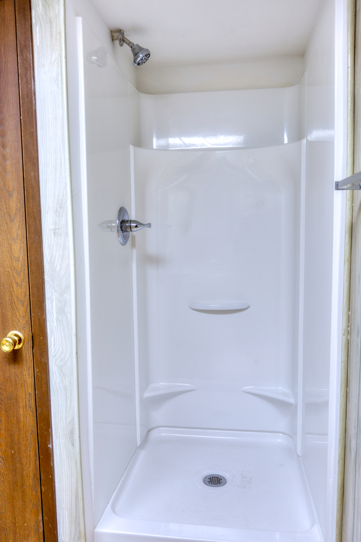 676 Swan Pond Road Jacob, IL 62950 - Photo 24 of 42 a bathroom with a shower