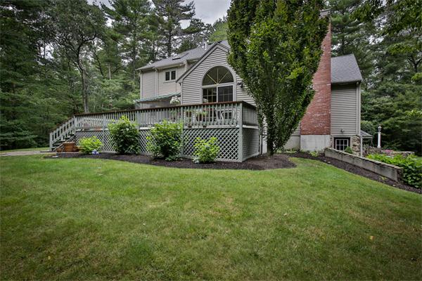 3 Deer Run Road Easton, MA 02356 - Photo 4 of 29 a front view of a house with garden