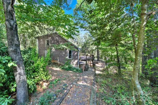 a view of backyard with green space