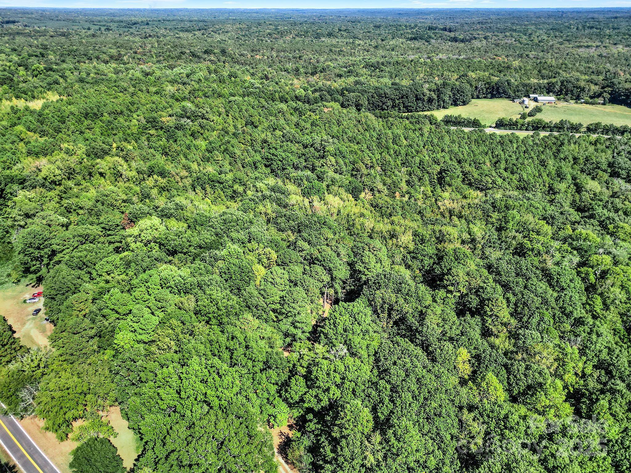 4768 Old Church Road Lancaster, SC 29720 - Photo 40 of 40 an aerial view of residential houses with outdoor space and trees