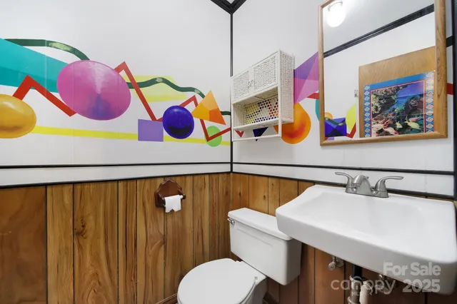 a view of empty room with a fireplace