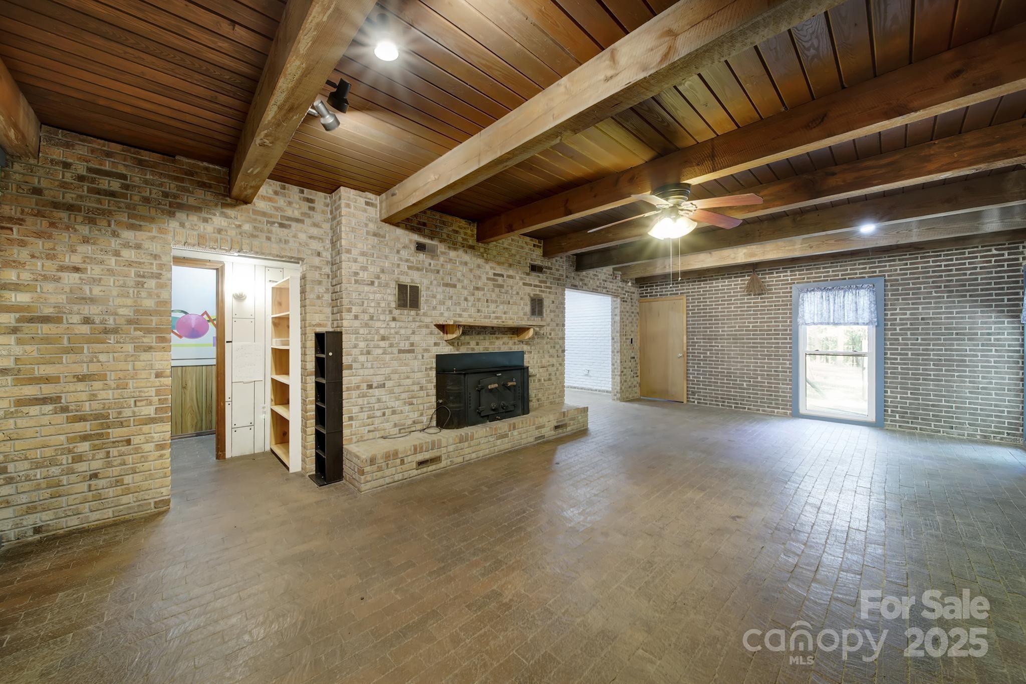 4768 Old Church Road Lancaster, SC 29720 - Photo 7 of 40 a view of empty room with a fireplace