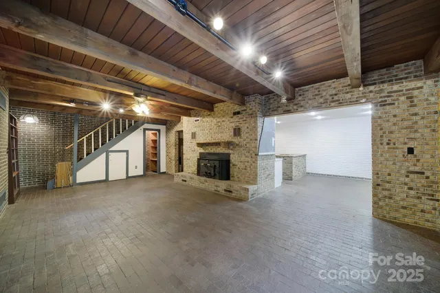 a backyard of a house with a tree