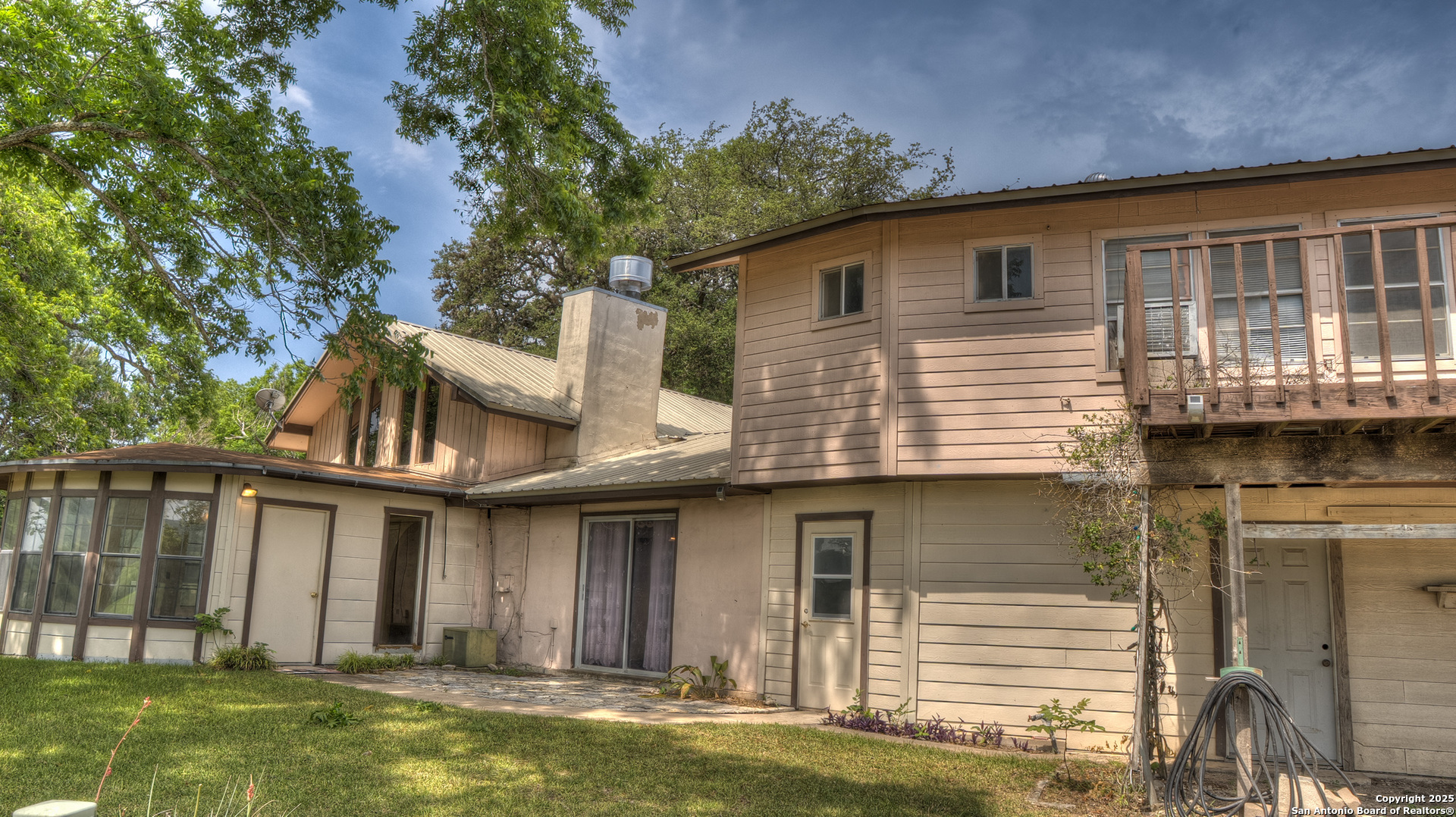 6671 Ranch Road 1120 Rio Frio, TX 78879 - Photo 12 of 47 a view of a house with a swimming pool