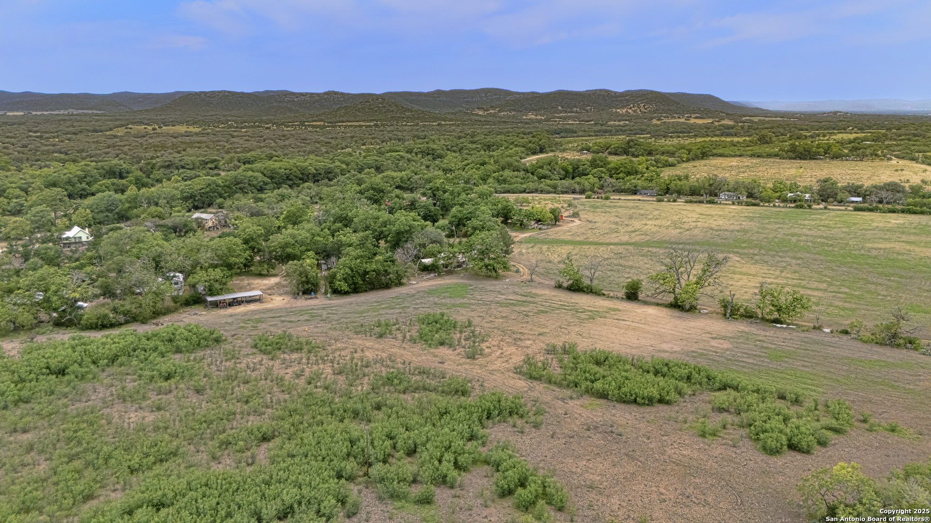 6671 Ranch Road 1120 Rio Frio, TX 78879 - Photo 2 of 47 a view of an ocean and a mountain