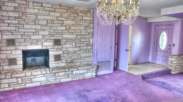 a spacious bathroom with a sink and a mirror