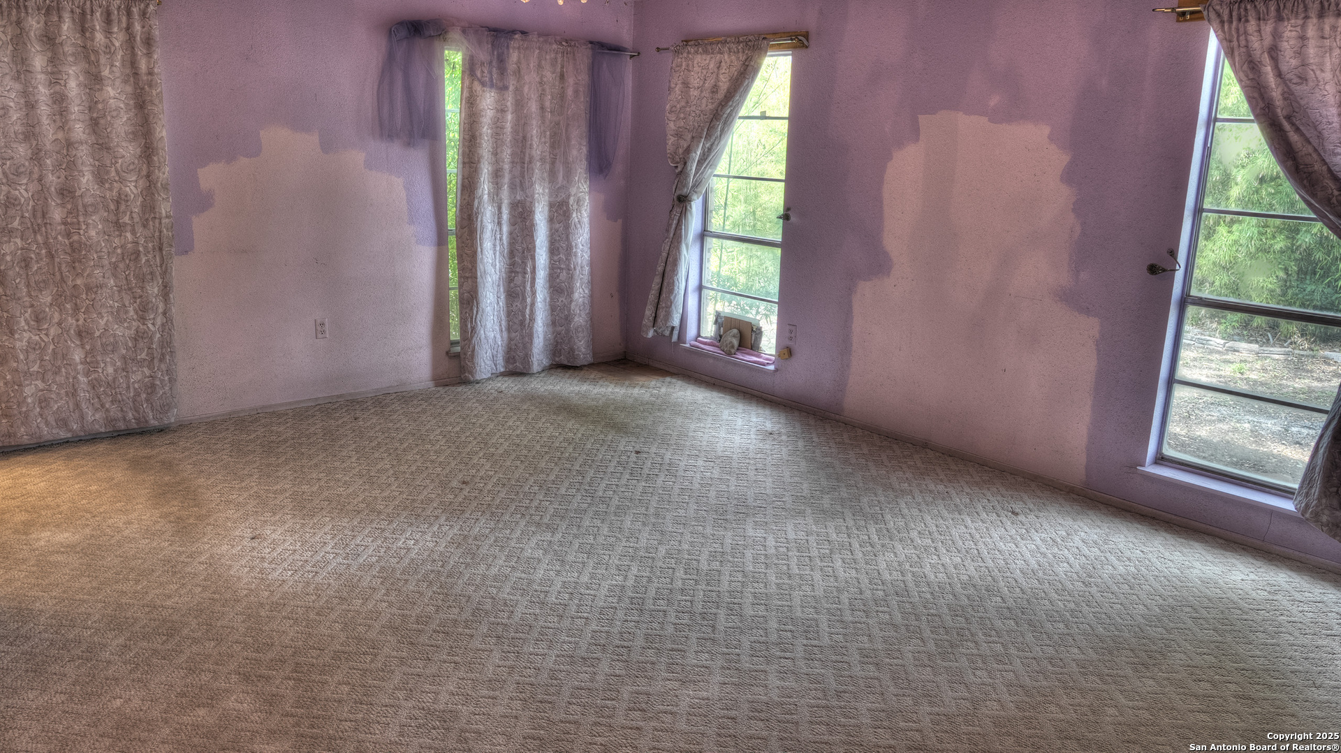 6671 Ranch Road 1120 Rio Frio, TX 78879 - Photo 32 of 47 an empty room with windows