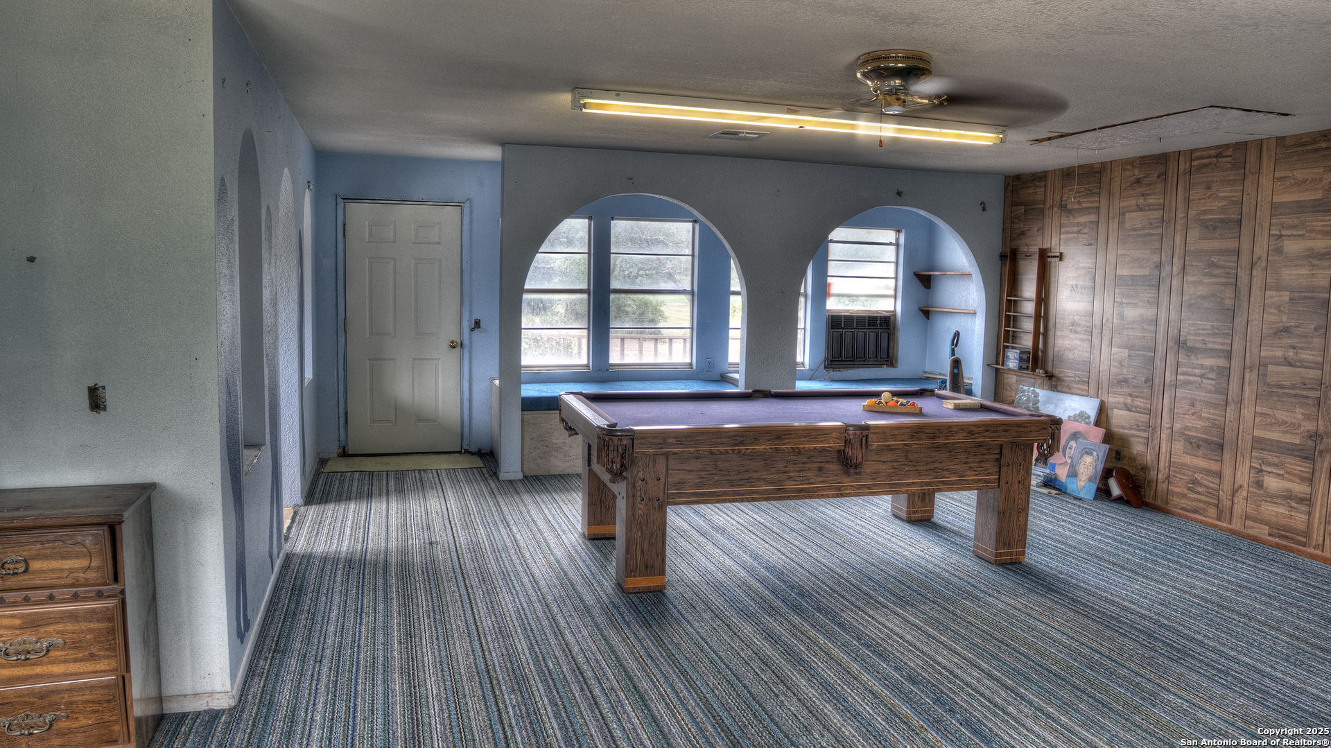 6671 Ranch Road 1120 Rio Frio, TX 78879 - Photo 39 of 47 a view of hall way with furniture and wooden floor