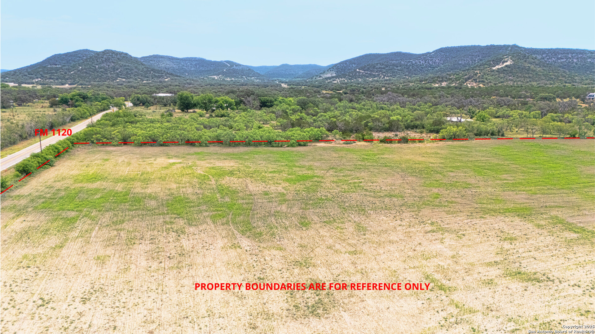 6671 Ranch Road 1120 Rio Frio, TX 78879 - Photo 44 of 47 a view of an aerial view of residential houses and lake view