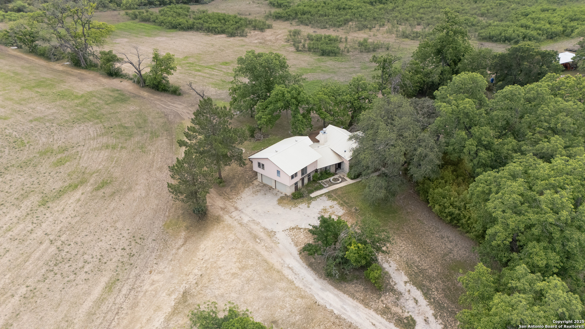 6671 Ranch Road 1120 Rio Frio, TX 78879 - Photo 5 of 47 a view of a garden with a lake