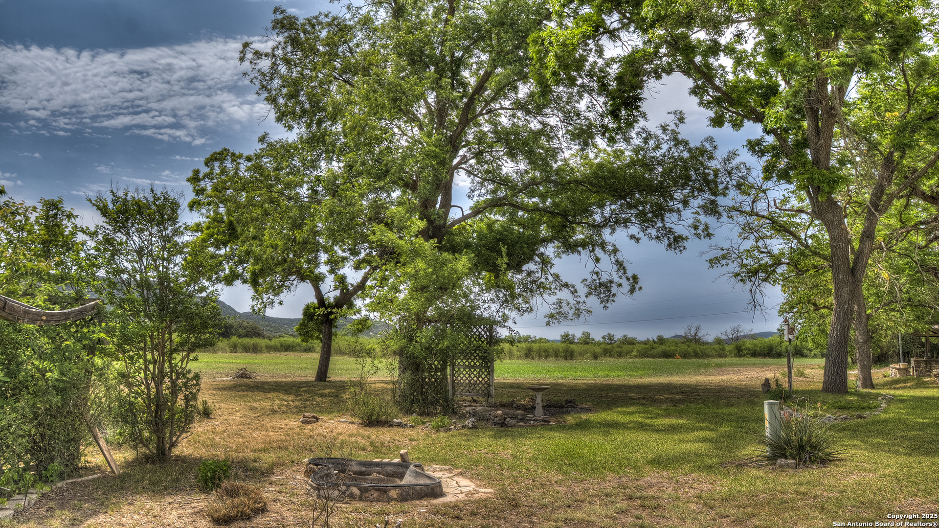 6671 Ranch Road 1120 Rio Frio, TX 78879 - Photo 10 of 47 a view of a yard with a tree