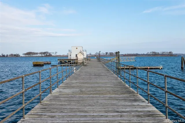 a view of a balcony with an ocean view