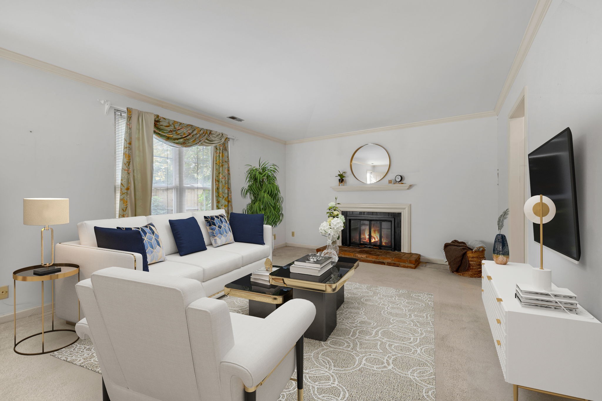 925 General George Patton Road Nashville, TN 37221 - Photo 5 of 32 a living room with furniture a fireplace and a flat screen tv