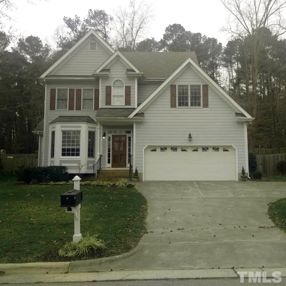 9425 Stone Mountain Road Raleigh, NC 27613 - Photo 1 of 25 a view of a yard in front of house