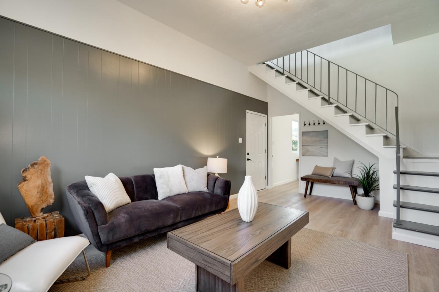 4615 Redding Street Oakland, CA 94619 - Photo 17 of 49 a living room with furniture and a table