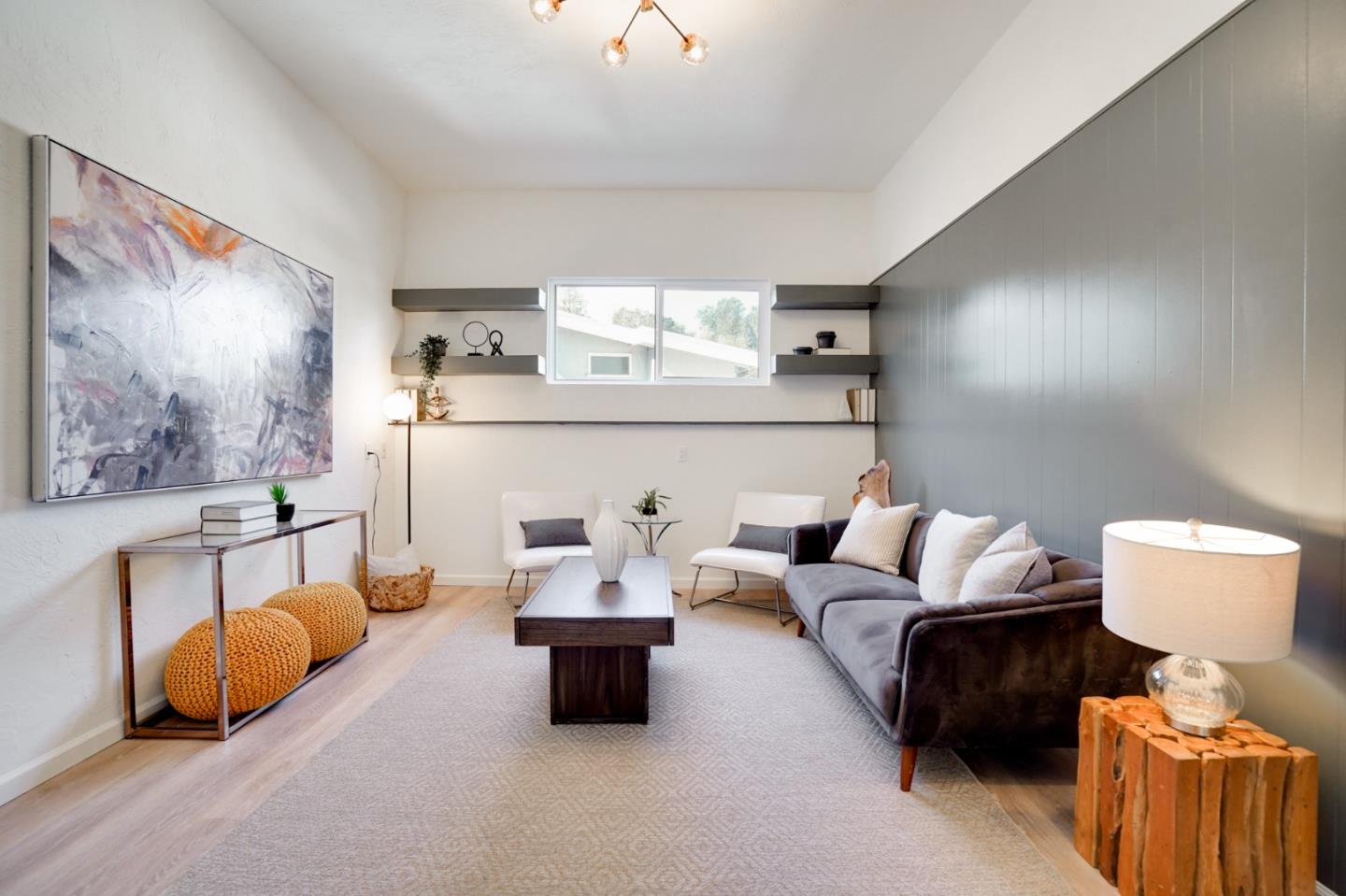 4615 Redding Street Oakland, CA 94619 - Photo 18 of 49 a living room with furniture and a lamp
