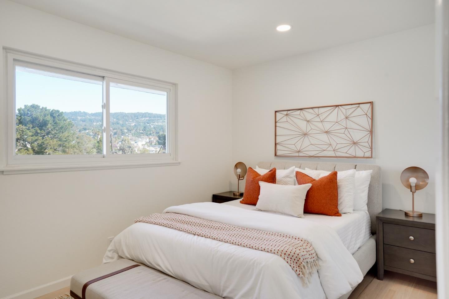 4615 Redding Street Oakland, CA 94619 - Photo 19 of 49 a bedroom with a bed and a window