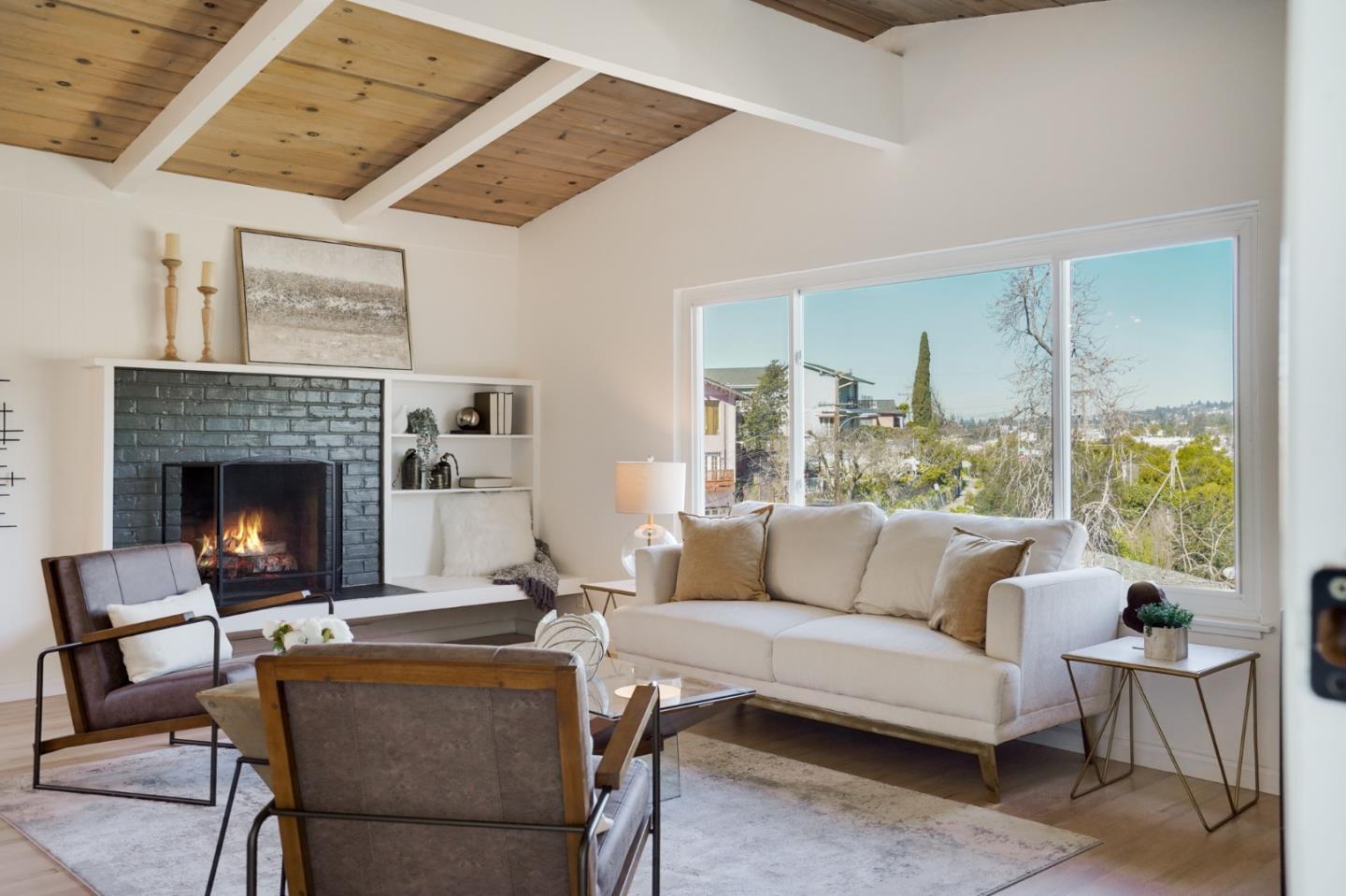 4615 Redding Street Oakland, CA 94619 - Photo 2 of 49 a living room with furniture and a fireplace